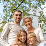 image of happy family in front of while house