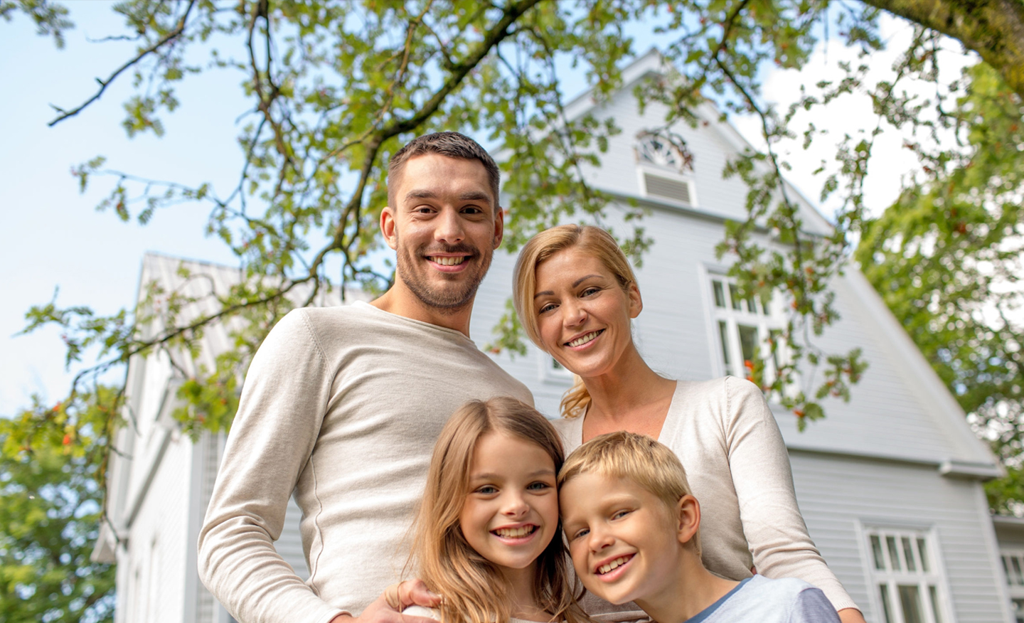 image of happy family in front of while house